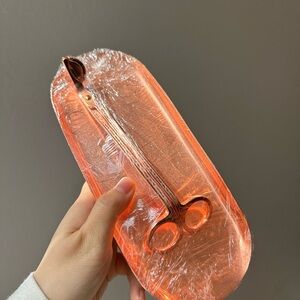 rose gold candle care set features a wick trimmer, and tray